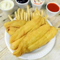 Flounder · Fried boneless fish fillets. Served with bread and coleslaw, fries or cajun rice.