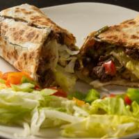 Philly Steak Wrap · Steak & cheese with onions , green peppers & mushroom.