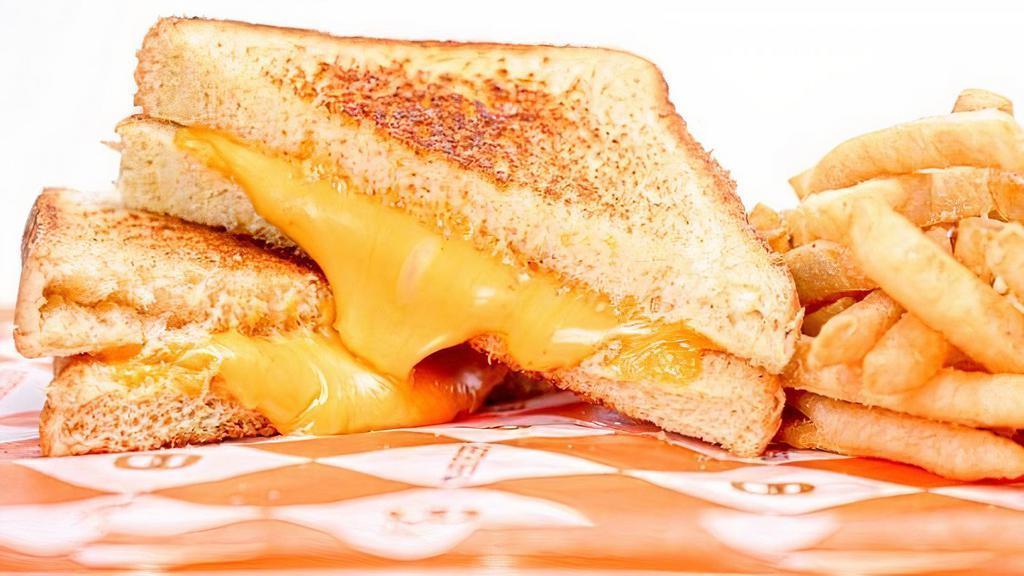 Kid'S Grilled Cheese · Three slices of melted cheese served on Texas Toast. Served with fries.