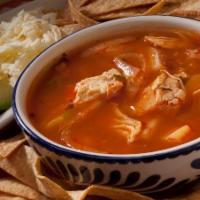 Chicken Tortilla Soup · Soup made with fried corn tortilla and seasoned tomato broth.