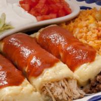 Enchiladas De Mesa · Three enchiladas with your choice of ground beef, chicken or vegetarian, topped with melted ...