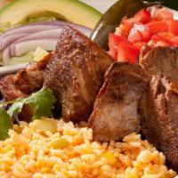 Carnitas · Tender pork tips served with avocado, lettuce, tomato, jalapeño, red onions and served with ...