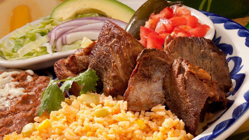 Carnitas · Tender pork tips served with avocado, lettuce, tomato, jalapeño, red onions and served with 2 sides and tortillas.