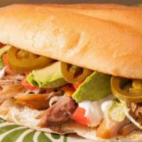 Torta · Mexican specialty sandwich filled with choice of carnitas, grilled steak, al pastor or grill...