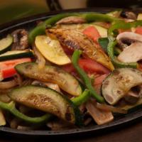 Fajita Vegetariana For Uno · Our special recipe with house potatoes, grilled bell peppers, onions, tomatoes, mushrooms, z...