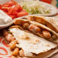 Quesadilla De Camarones · Large quesadilla stuffed with grilled shrimp and vegetables. Served with lettuce, tomato, an...