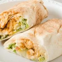 Shawarma Wrap · Grilled chicken or beef, lettuce, tomatoes, pickle, onion and garlic sause.