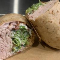 Turkey Ranch Wrap · Sliced turkey breast, applewood bacon, ranch, lettuce, and tomato, wrapped in a sun-dried to...