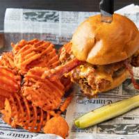 Smokehouse Bbq Burger · 1/2 lb. Angus beef topped with smoked bacon, Cheddar cheese and onion rings, served with BBQ...