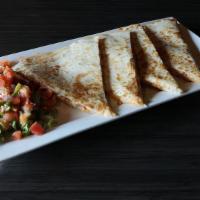 Chicken Quesadilla · Grilled flour tortilla loaded with chicken, melted Pepper Jack and chihuahua cheeses, served...