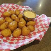Cheese Curds · white cheddar curds, beer batter, choice of marinara, ranch or red pepper aioli