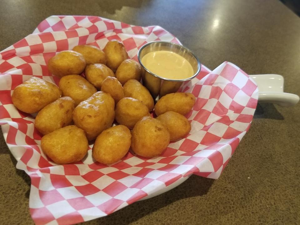 Cheese Curds · white cheddar curds, beer batter, choice of marinara, ranch or red pepper aioli