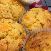 Jalapeno Cheddar Cornbread Muffins · four muffins, served warm with honey butter
