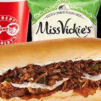 Combo Meatzilla Cheesesteak · Three crave-worthy meats: Sirloin Cheesesteak, Beef Brisket & Bacon topped with sautéed Gree...