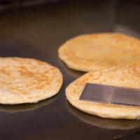 Paratha Flatbread ((Extra Pcs) · An extra paratha flatbread to enjoy with your bowls, sides or just cause.
