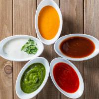 Bombay Fire Sauce (Extra Cup) · An extra 2oz cup of homemade Bombay Fire sauce