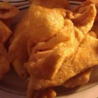Crab Rangoon · Served with House Sweet & Sour Sauce and Mustard Sauce.