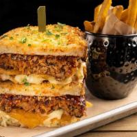 Meatloaf Grilled Cheese · house-made glazed meatloaf, potato chips, crispy garlic & shallots, creamy herb cheese, Till...