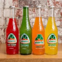 Jarrito Pineapple · Jarritos, in a glass bottle.