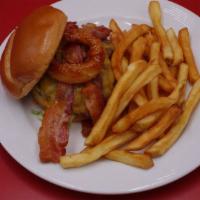 Cowboy Burger · Bacon, onion ring, grilled onions, cheese bbq sauce.
