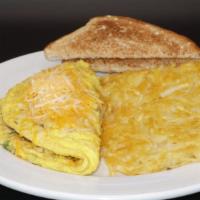 Veggie Omelette · Spinach, mushrooms, onions, tomatoes, green peppers. Cheese with hash brown and toast.