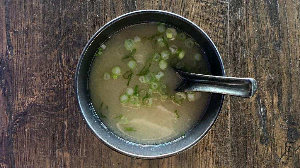 Miso Soup · Soybean paste soup w/ tofu, green onion and seaweed.