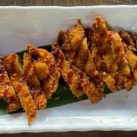 Chicken Katsu · Marinated chicken, battered in panko break crumbs, deep fried w/ teriyaki sauce.