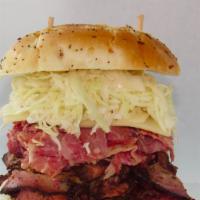News · Corned beef, pastrami, coleslaw, melted Swiss cheese and Russian dressing on an onion roll.