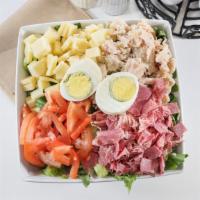 Julianne Salad · Turkey breast, corned beef, Swiss cheese, tomato, hard boiled egg and ranch dressing on a be...