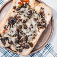 Jerk Philly By Jerk 48 · By Jerk 48. Jerk Philly steak with mixed bell peppers, white onions, mozzarella cheese, and ...
