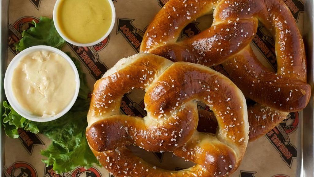 Bavarian Pretzel · Grab a beer! Served with Tank 7 cheese sauce and homemade Pale Ale mustard.