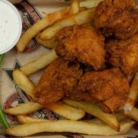 Dozen Boneless · dozen wings served on a bed of fries with ranch or bleu cheese dressing.