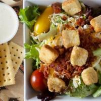 The Field House · Cheese, bacon, croûtons and tomatoes on our salad blend. Served with choice of dressing.