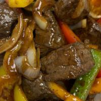 Steak Bites · Cut up steak bites with green onions and peppers