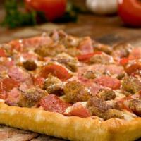 Meatworks Whole Pan-Style Pizza · Five tasty meat toppings, a meat lovers dream. Italian sausage, pepperoni, crispy bacon, gro...