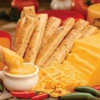 Breadsticks (6) · Rocky's famous breadsticks. 590 cal. Served with 1 cup of marinara sauce (25 cal)