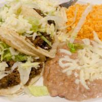 Taco Dinner · Three tacos - beef, chicken, steak, pork, chorizo eggs, or fish