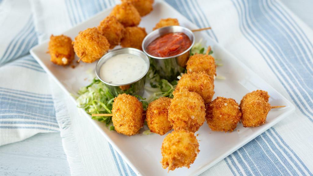 Garlic Parmesan Cheese Skewers · Hand-breaded mozzarella with a little crunch & a whole lotta garlic Parmesan flavor. Served with classic marinara & ranch.