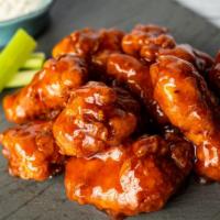 Boneless Wings · Hand-breaded & tossed in your choice of spicy Buffalo, cherry cola BBQ or sweet chili, serve...
