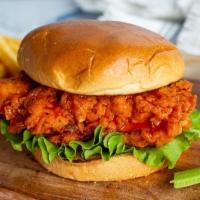 Big Ol’ Buffalo Chicken · Hand-breaded crispy chicken tossed in buffalo-style hot sauce  with garden fresh lettuce on ...