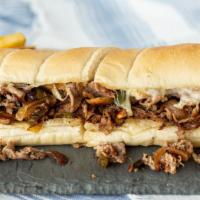 Philly Steak · Shaved steak, sautéed onions, green peppers and mushrooms with melted Mozzarella on a hoagie...