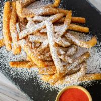 Funnel Fries · Tasty, deep-fried funnel cake fries dusted with powdered sugar & served with a side of straw...