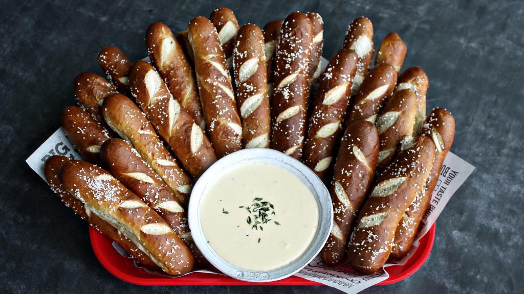 Party Platter Pretzel Sticks · 25 warm house-baked pretzels, with white cheddar queso.