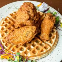 Chicken & Waffles · Four golden brown wings and one buttermilk waffle.