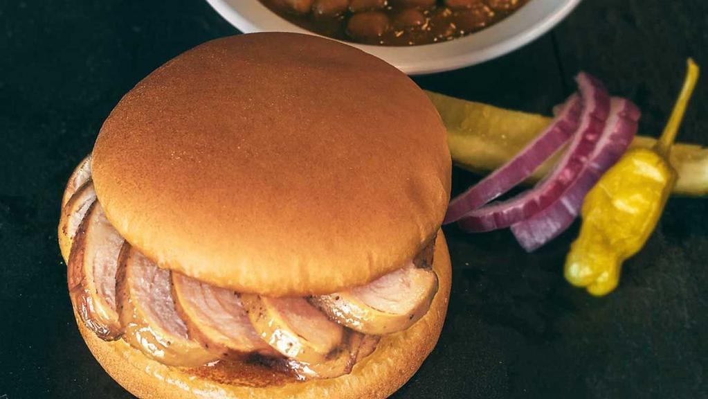 Turkey Sandwich · A hearty helping of our slow-smoked turkey served on soft, fresh sandwich bun. Includes 1 of our delicious sides, pickle, pepper, onion & our famous BBQ sauce.