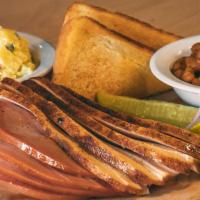 2 Meat Dinner · Bring on the meat with this hearty 2-meat combo! Your choice of two of our slow-smoked meats...