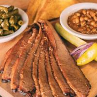 Sliced Brisket · Includes our slow-smoked brisket, 2 of our delicious sides, pickle, pepper, onion & our famo...