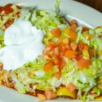 Enchiladas Super Rancheras · Five different enchiladas, one each of beef, chicken, shredded beef, beans and cheese, toppe...
