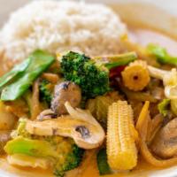 Pad Pek Curry Lunch · Thai red curry with coconut milk stir fried with carrots, broccoli, waterchestnuts, Napa, ba...