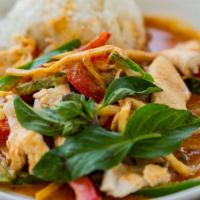 Gang Gai Dinner · Thai red curry with coconut milk, bamboo shoots, green peppers, mushrooms and basil.